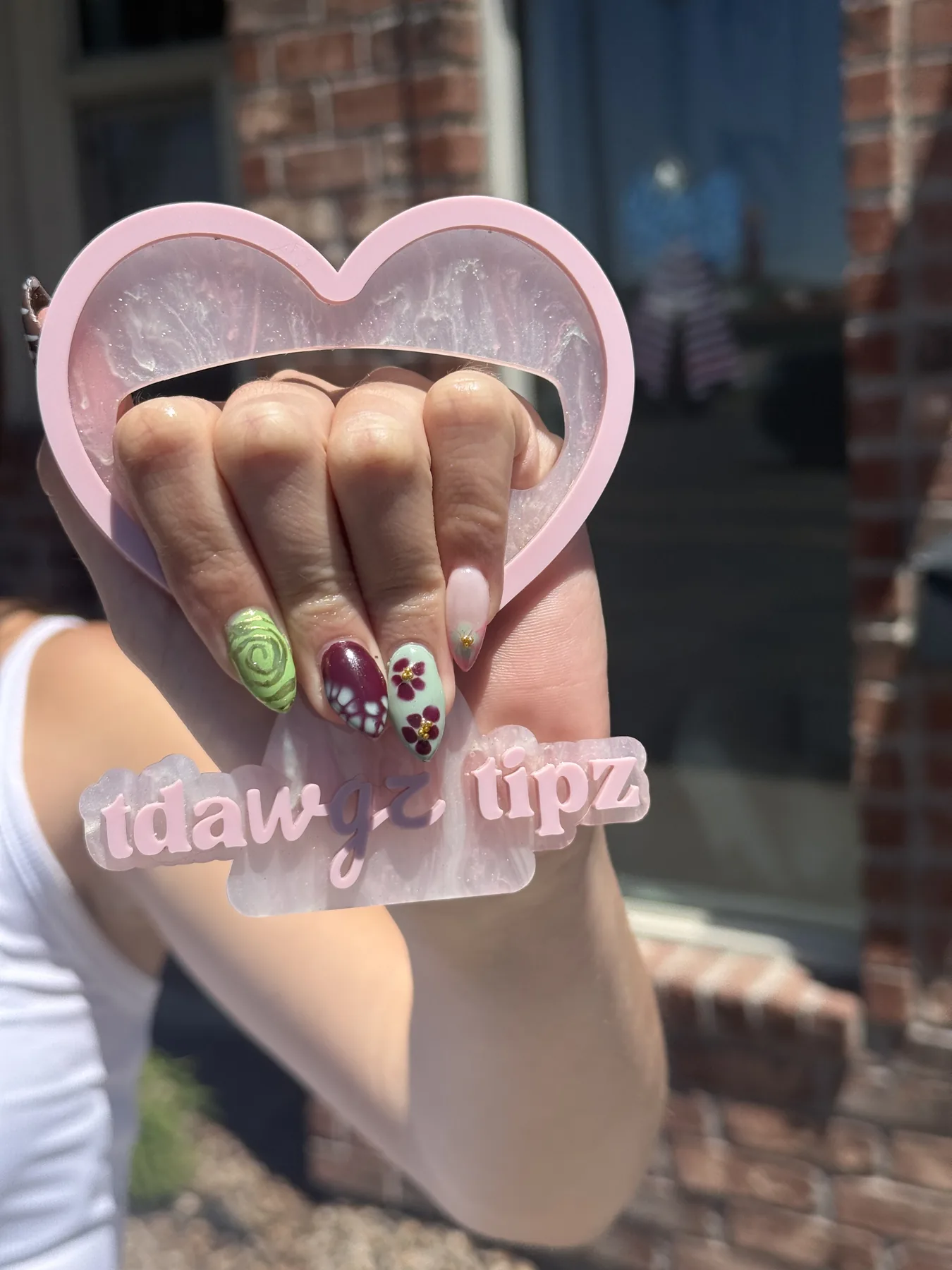 Custom nail art by Taelyr at Mane Haevn Salon
