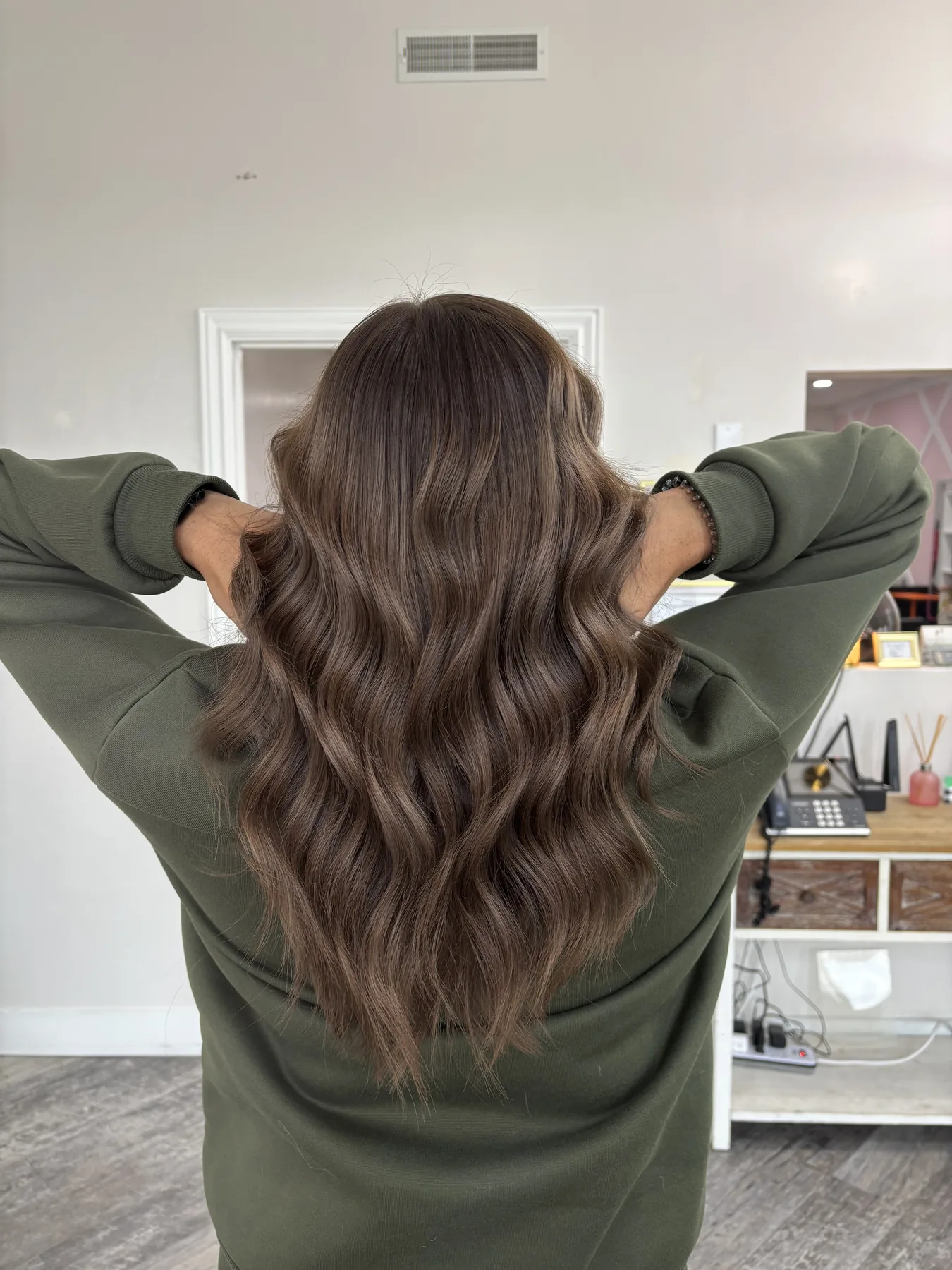 Brunette color and styling by Tiffany